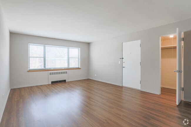 1 BR, 1 BA - Living Room - HOMESTEAD APARTMENTS