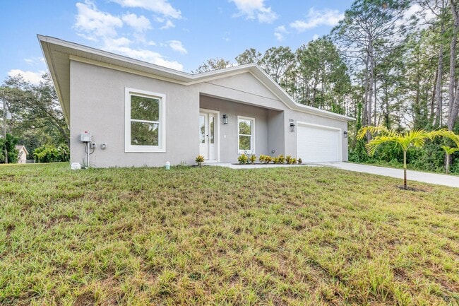 Photo - BRAND NEW! 4/2 PALM BAY!