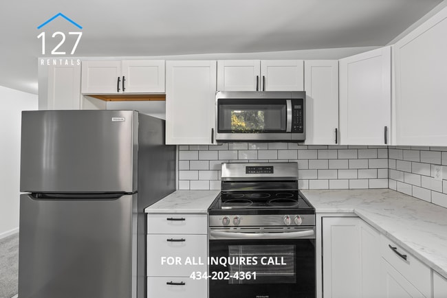 Photo - Updated 3BR Apartment with Modern Kitchen & Central Air