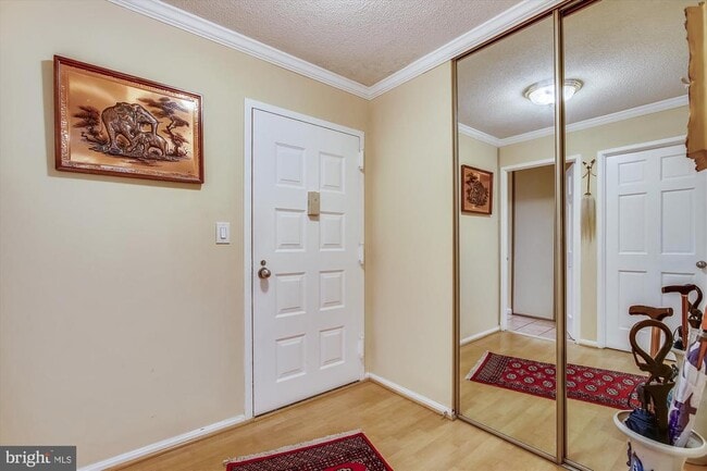 Building Photo - 8360 Greensboro Dr Unit 712