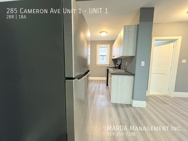 Photo - MODERN 2BED/1BATH APARTMENT NEAR UNIVERSITY OF WINDSOR+HYDRO Unit 1