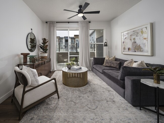 Living Room with Large Window - Parc Ridge Apartments