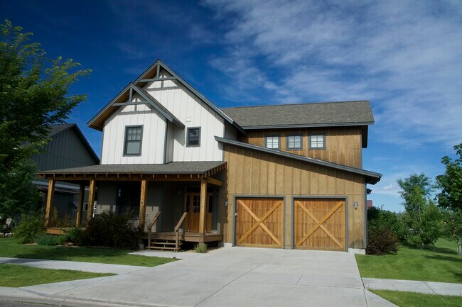 Front of house with two car attached garage. - 2414 Arabian Ave
