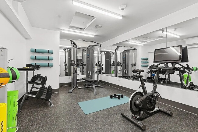 Building Photo - "Luxury 1-Bedroom Oasis with Pool & Elegant Finishes in Prime New York Location!"