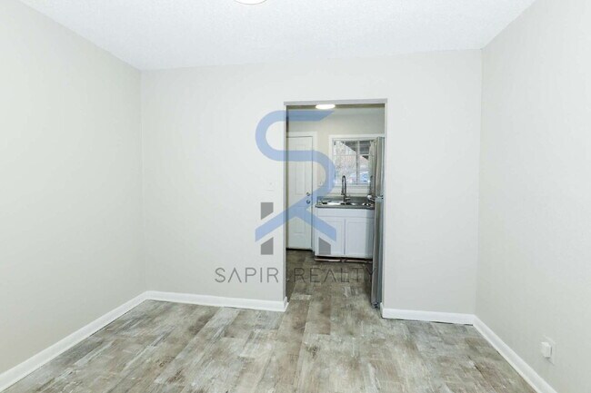 Photo - Move-In Ready! Freshly Updated 2BR/1.5BA with All-Electric Living Unit 6