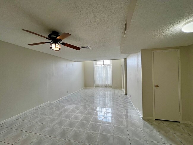 Photo - TWO BEDROOM TOWNHOME WITH VAULTED CEILING AND GRAND FRONT WINDOWS