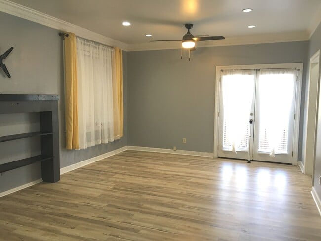 Building Photo - Midtown 2 story condo. Over 1200 sq ft of living space! Fenced in back yard! Pets are owner's app...