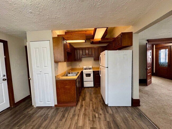 Photo - Racine Cozy 1BR / 1BA Apartment | Off-Street Parking + Appliances +  Walk-In Shower Unit 2 - UPPER #2
