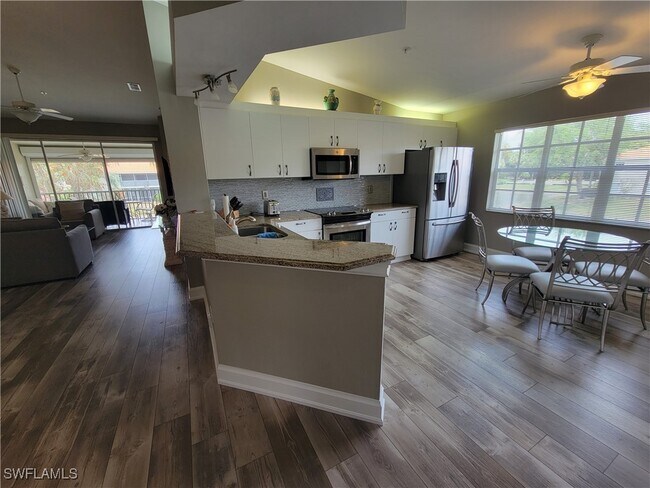 Building Photo - 7577 Silver Trumpet Ln Unit T-204
