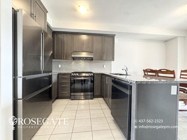 Building Photo - Spacious 4-Bedroom Freehold Townhome with Garage & Backyard – Brampton