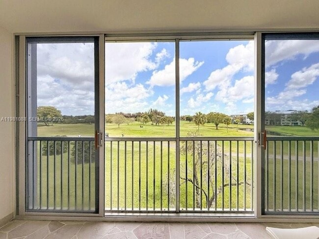 Building Photo - 12701 SW 13th St Unit 310F