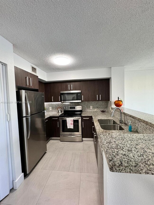 Building Photo - 4420 NW 107th Ave Unit 206