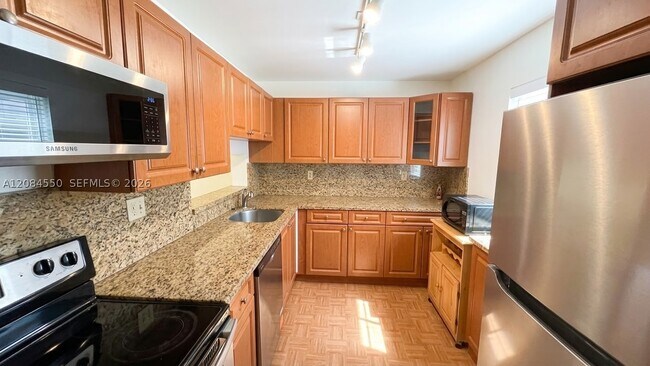 Building Photo - 8520 SW 133rd Avenue Rd Unit 210