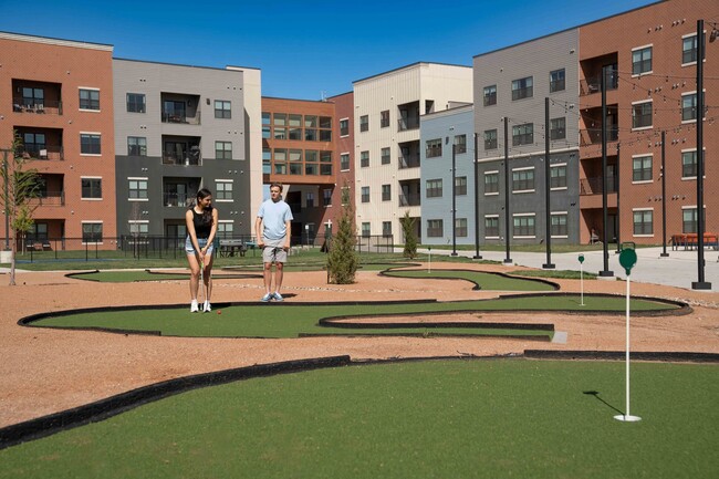 Embrace the outdoor lifestyle at Union Mill, featuring an inviting putting green perfect for leisure and socializing. Enjoy modern living with a vibrant community atmosphere. Come see what awaits you today!