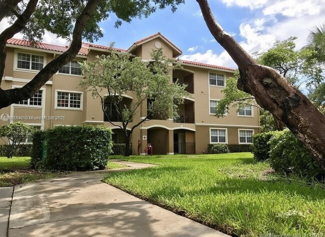 Building Photo - 11650 SW 2nd St Unit 16-208