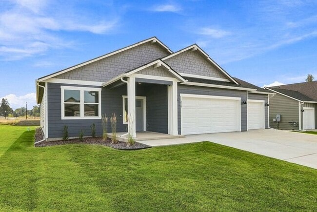 Photo - Modern 4-Bedroom Home with a 3-Car Garage & Covered Patio