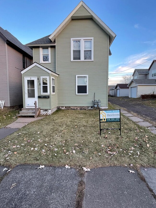 Building Photo - 410 N 52nd Ave W Unit #1