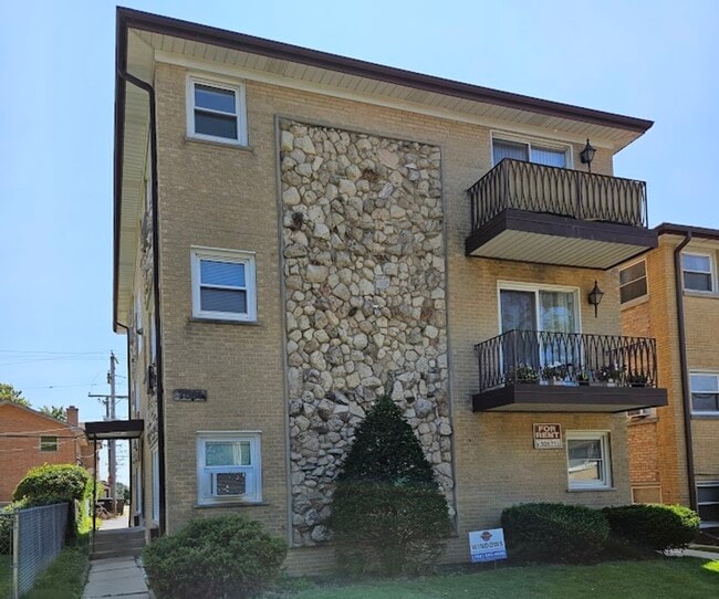 Building Photo - 7511 W Fullerton Ave Unit 3S Rental