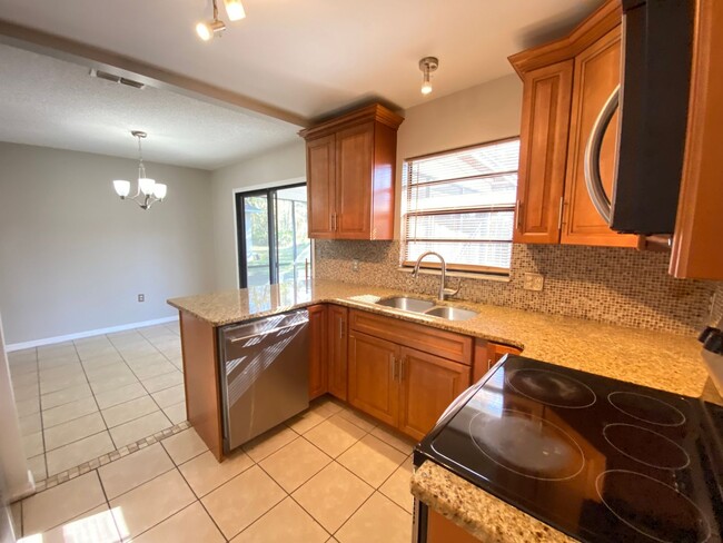 Photo - 2/2 home with garage - tile on inside with...