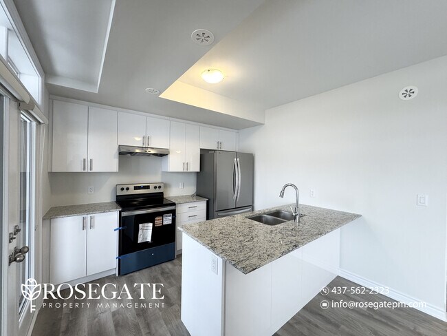 Photo - Beautiful 3-Bedroom Townhouse with Garage, Driveway Parking & Private Outdoor Space in Caledon