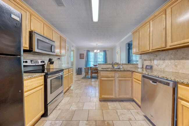 Photo - 4235 King Arthur Pl Unit ID1043511P