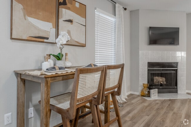 1BR, 1BA - 640SF - Dining Room and Fireplace