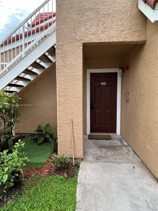Building Photo - 15581 SW 104th Terrace Unit 214
