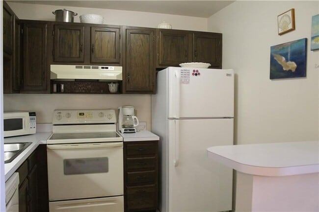 Photo - ANNUAL RENTAL 1/1 COMING SOON 55+ Unit 104