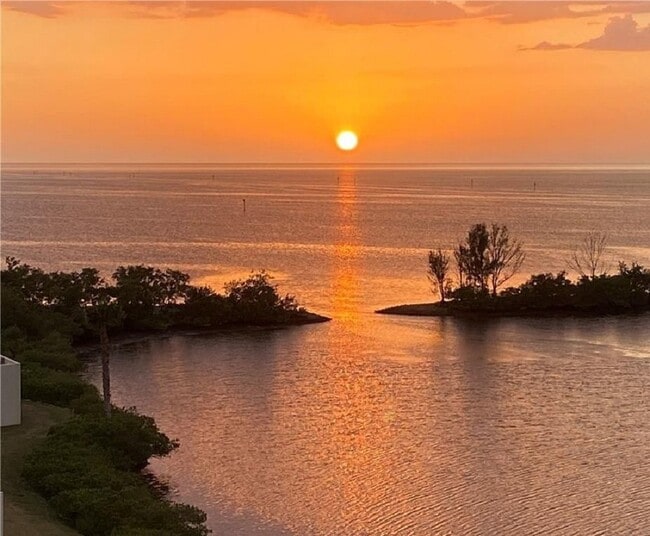 Sunset in the horizon as seen from the balcony - 5915 Sea Ranch Dr Unit 407