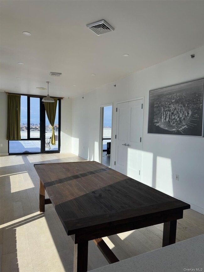 Building Photo - 88-08 Justice Ave Unit PhB