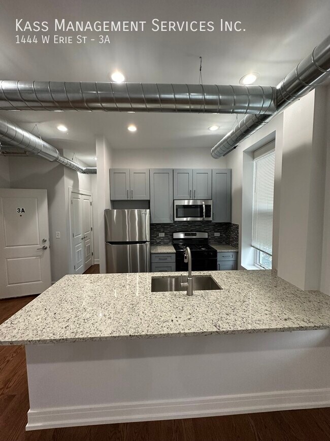 Building Photo - 1444 W Erie St Unit 3A Rental