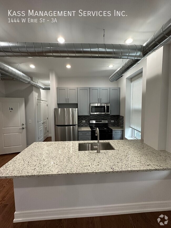 Building Photo - 1444 W Erie St Unit 3A Rental