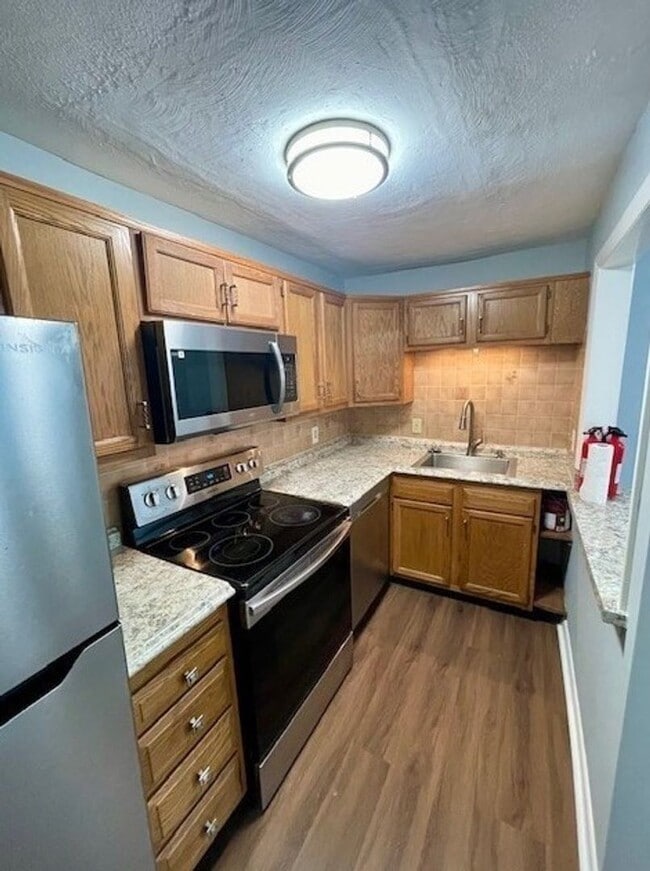 Photo - Fresh 1 Bedroom Corner Condo with 2 Off Street Parking Spaces