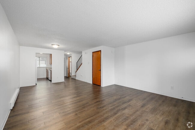 2BR, 1.5BA - 1,177SF - Living Room - Aladdin Townhomes