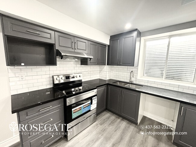 Building Photo - Pet-Friendly 2-Bedroom Basement Apartment with Parking – Milton Unit 2