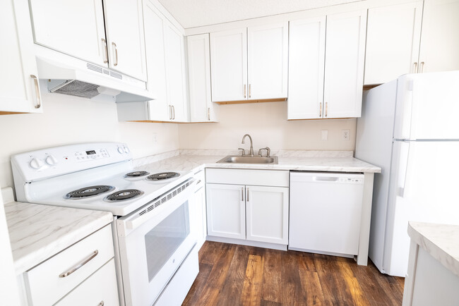 Renovated Kitchen - The Grove of White Bear Lake Apartments