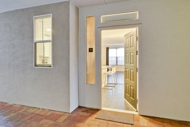 Photo - Modern Ground Floor Rivermark Condo with Patio Resort Style Amenities and Secure Parking Unit 153