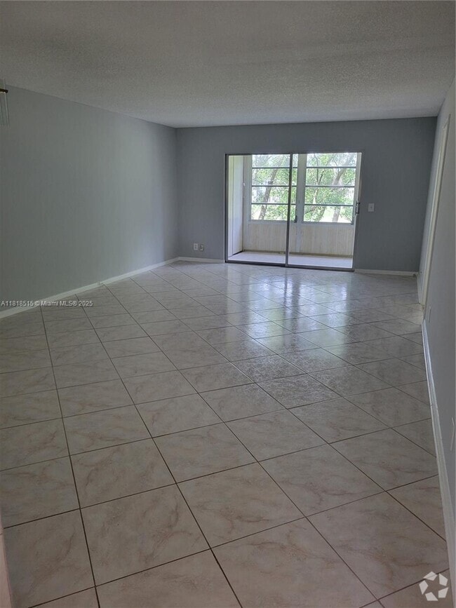Building Photo - 1300 SW 125th Ave Unit 310K Rental