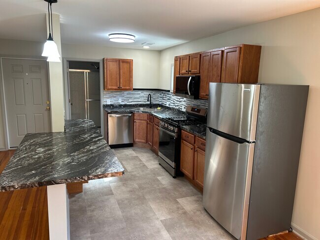 Kitchen - 8575 Main St Unit APT #1