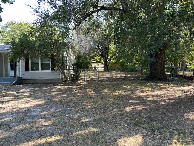 Yard with Dog Run and Trees - 2626 W Johnson St
