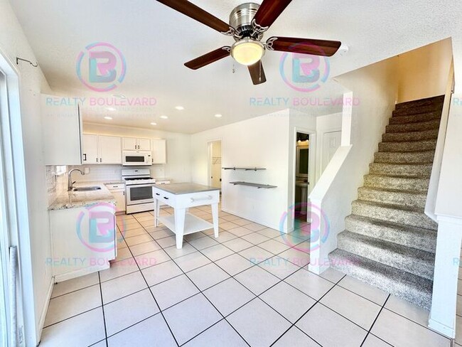 Photo - Gorgeous 4BR Home with Granite Counters, Open-Concept Living & 2 car garage