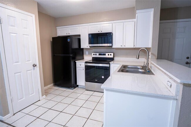 Building Photo - 10309 Brownie Dr