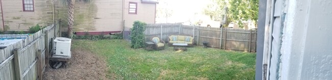 Backyard - 57 Carolina St Apartments
