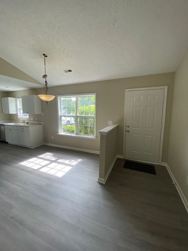 Photo - Welcome to this charming 3-bedroom, 2-bathroom home located in the vibrant city of Wilmington, NC.