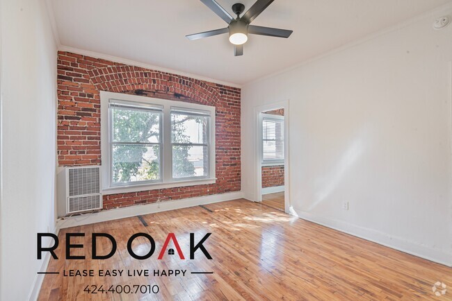 Building Photo - Stylish Studio with Exposed Red Brick, Sta... Unit 203 Rental