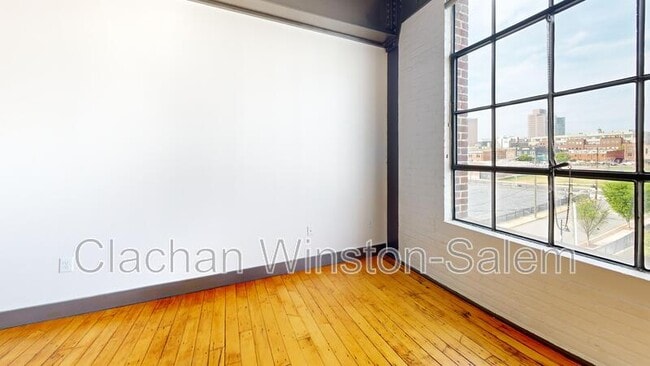 Building Photo - 101 E. Sixth St. Unit 604