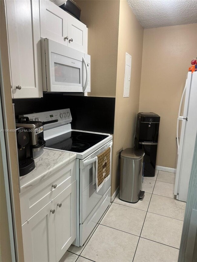 Building Photo - 7421 SW 152nd Ave Unit 9-202