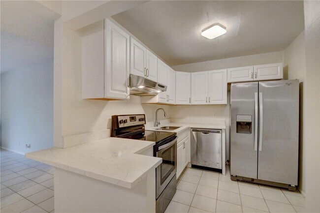 Building Photo - 490 NW 20th St Unit A-315