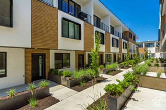 Photo - 2 bed + Bonus Room Townhome in Millcreek, $250 OFF THE FIRST FULL MONTH'S RENT!