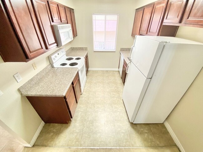 Photo - GUARD-GATED 1-BEDROOM CONDO WITH COMMUNITY POOL